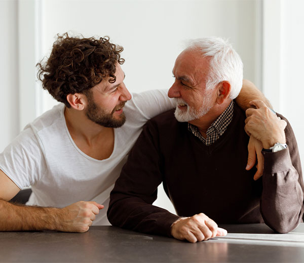 Happy old man with hirs son
